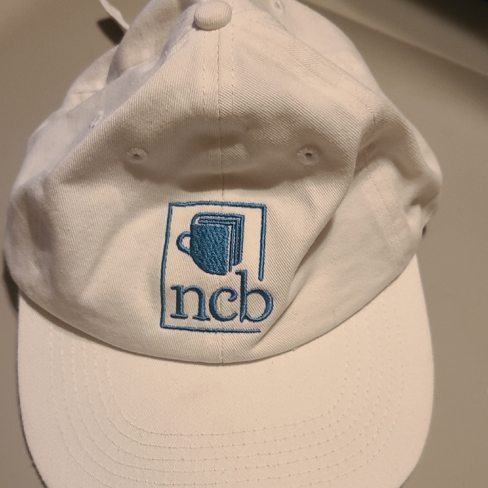 White Cap with Blue Embroidery